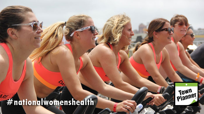 Women exercising on stationary bikes